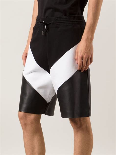 mens givenchy shorts|Givenchy track pants.